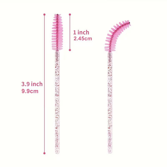 Two pink disposable mascara brush wands with glitter handles, length marked 3.9 in and 1 in
