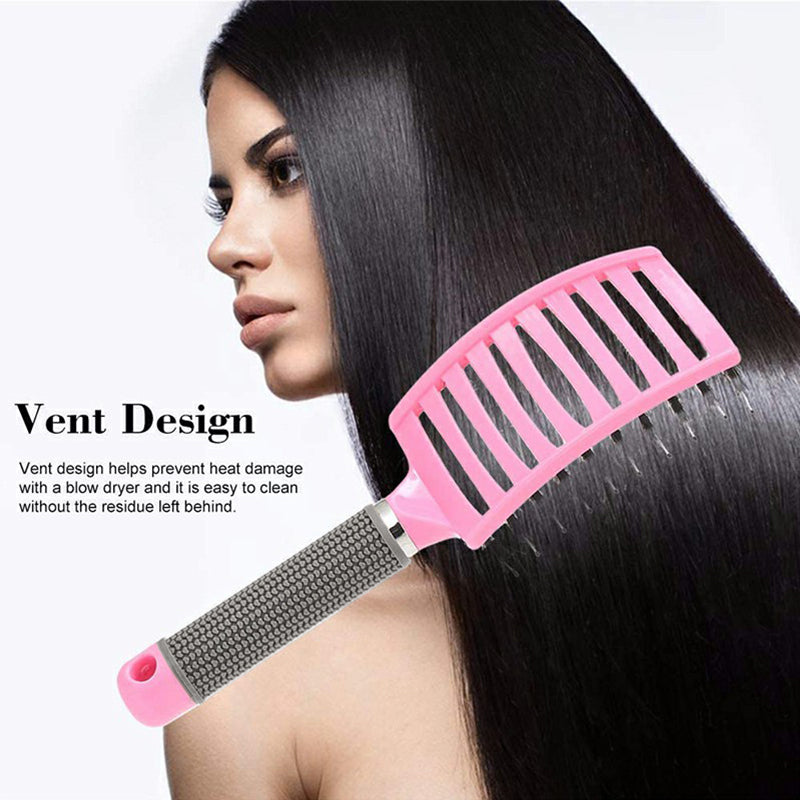 Pink detangling brush with vented slots on straight black hair near face