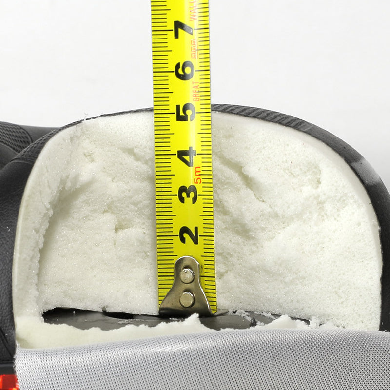 Black gel bike saddle cushion with ruler measurement, padded height