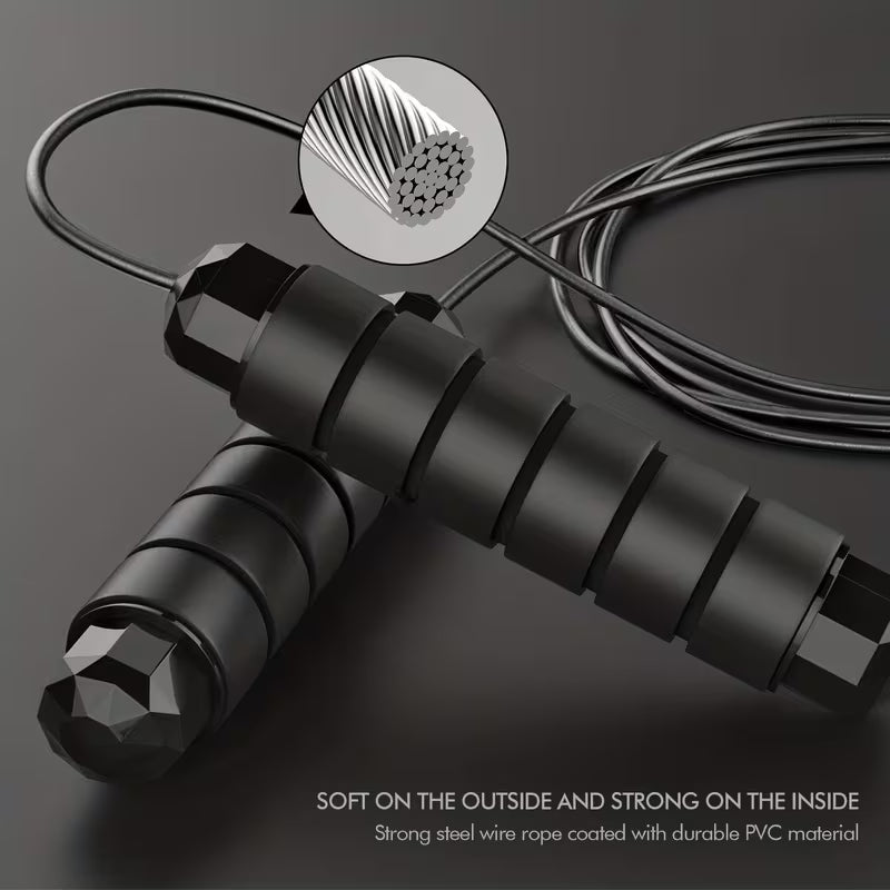 Jump rope with black foam handles and smooth ball-bearing cable, coiled