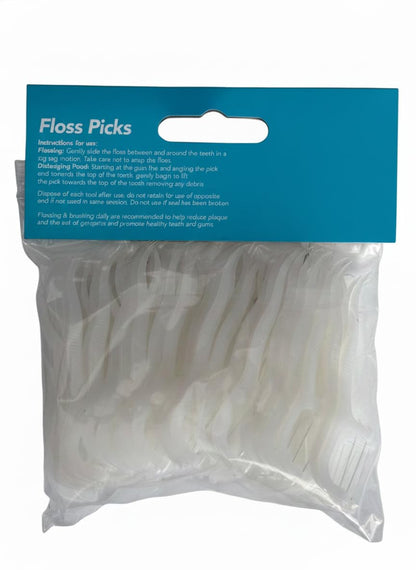 Dental floss picks bag pack with white floss strands in clear plastic pouch