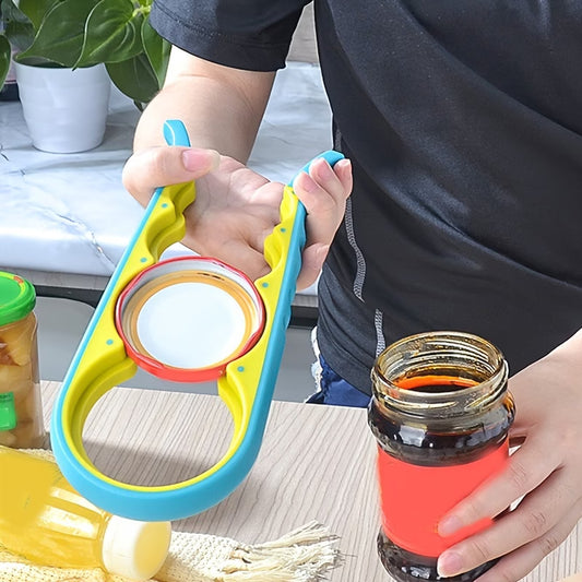 Blue and yellow jar opener tool gripping a jar lid while held by hand