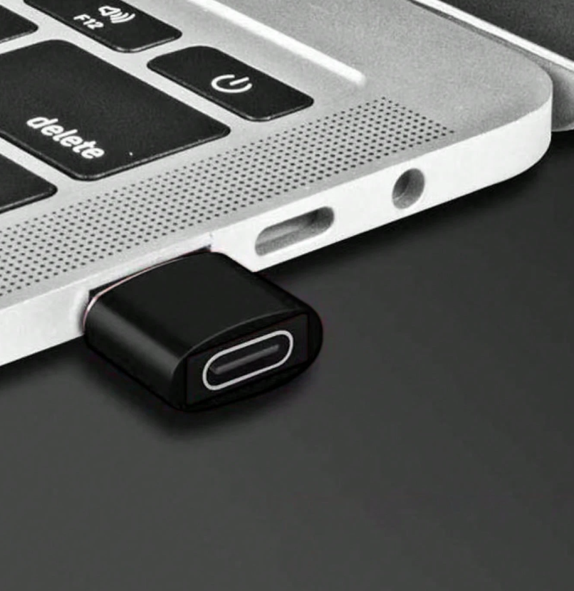 USB-A to Type-C adapter head, black housing with Type-C port exposed, close-up