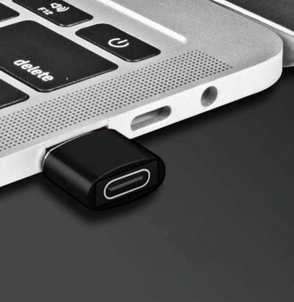 USB-A to Type-C adapter head, black housing with Type-C port exposed, close-up