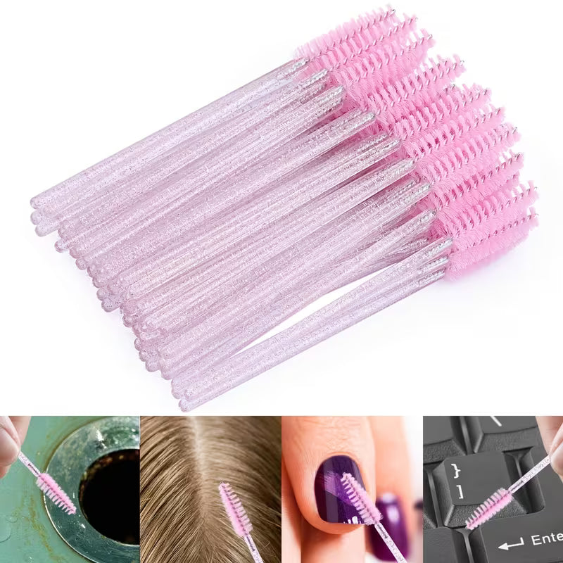 Disposable mascara and eyebrow brush heads, stacked pink bristles on clear glitter handles