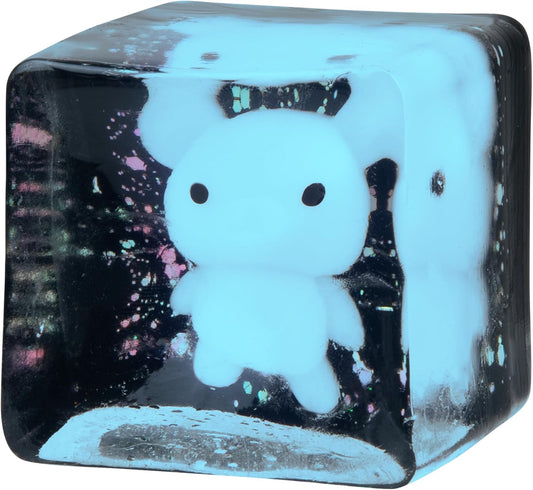 Blue bear squishy stress cube with black-speckled glowing face, square clear case