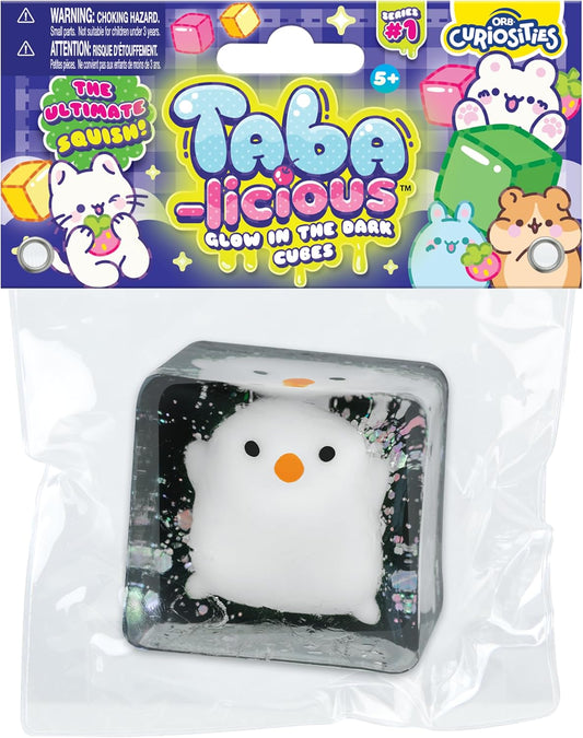 Chick glow-in-the-dark stress cube toy in blister package, white face with orange beak