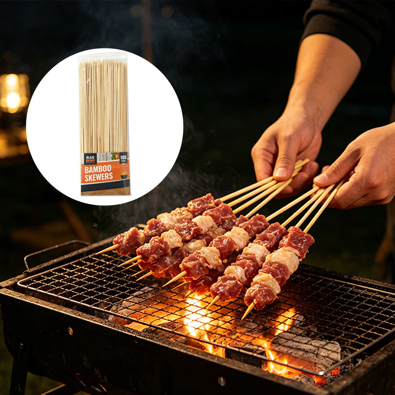 Bamboo skewers in use on a barbecue grill, with meat pieces cooking over flames