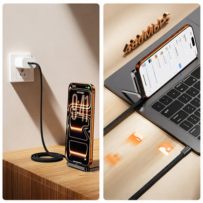USB-C to USB-C cable and foldable phone stand charging a smartphone beside a laptop