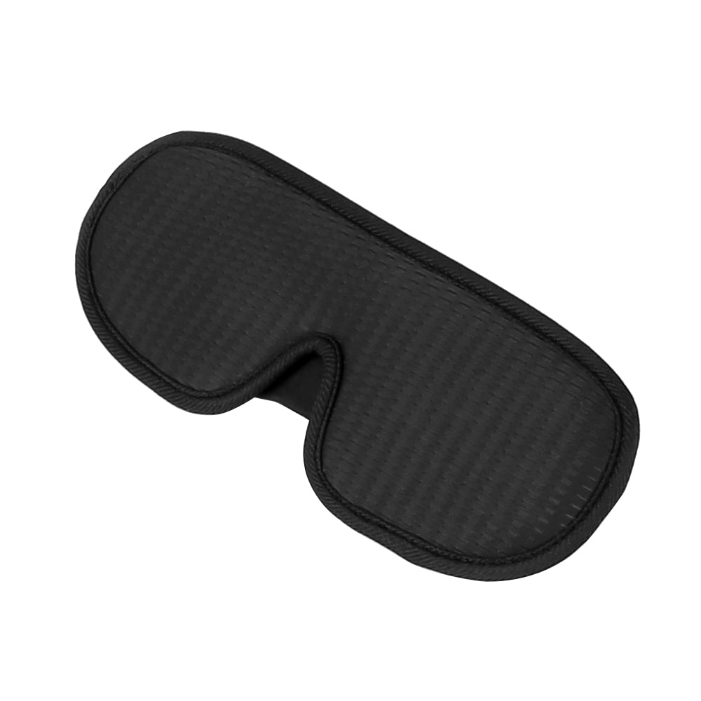 Black padded eye mask with contoured single-piece cover and stitched edges
