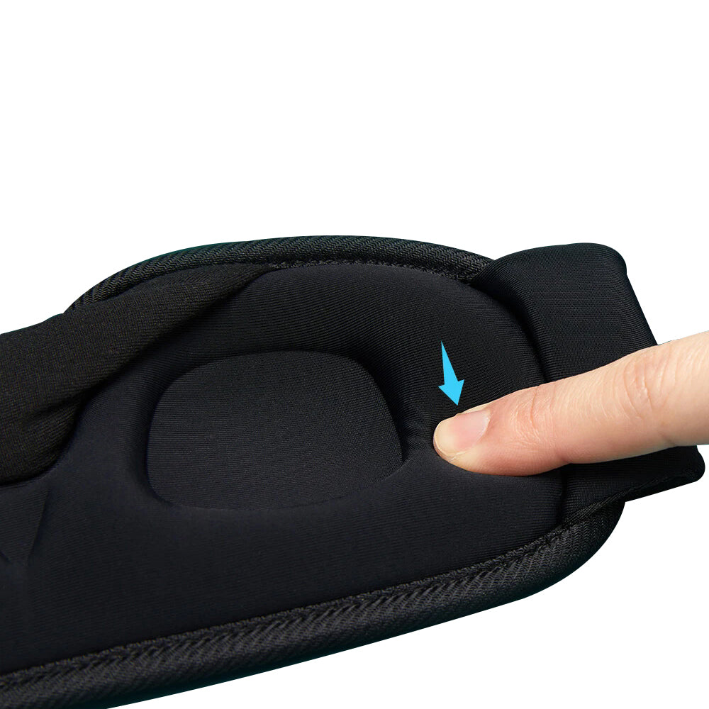 Close-up of black padded eye mask with flexible inner curve