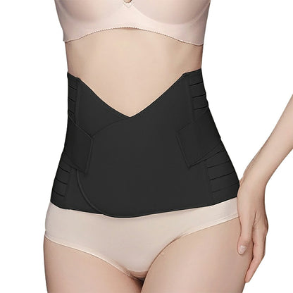 Black postpartum corset recovery belt worn at the waist over light-colored underwear