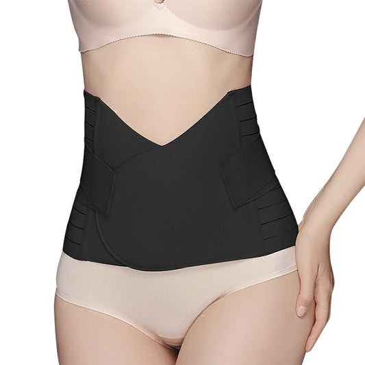 Black postpartum corset recovery belt worn at the waist over light-colored underwear