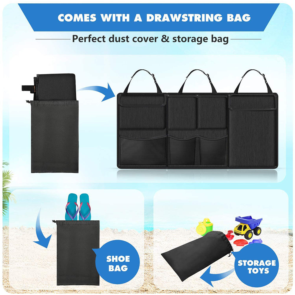 Black seat-back organizer with multiple front pockets, shown with included dust-cover drawstring bag