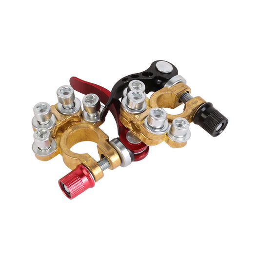 Dual battery terminal clamps with gold brass ring, silver screws, red and black levers