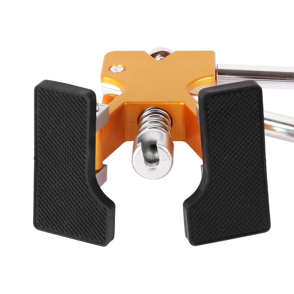 Car dent puller lifter tool with orange housing and two black textured grip pads