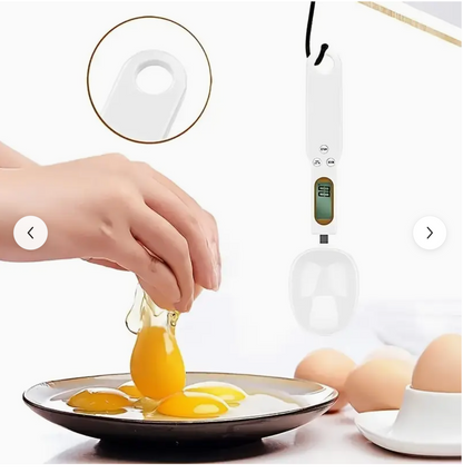 Digital kitchen spoon scale being used above a pan, white scoop with LCD