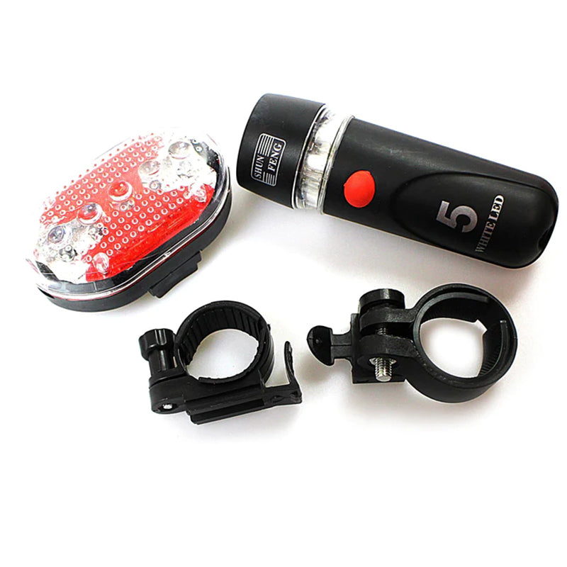 Waterproof bicycle LED headlight with red lens, black torch body, and handle mounts