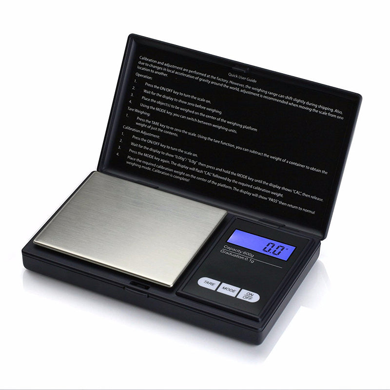 Digital pocket mini jewellery weighing scale with open cover and metal platform, display on