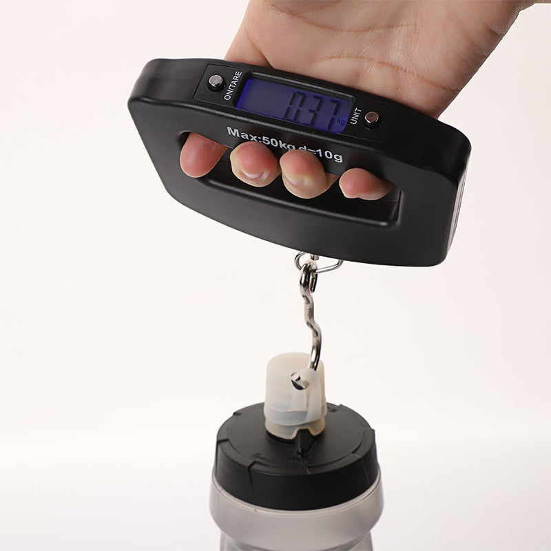 Handheld luggage weighing scale with blue-lit digital screen and metal chain