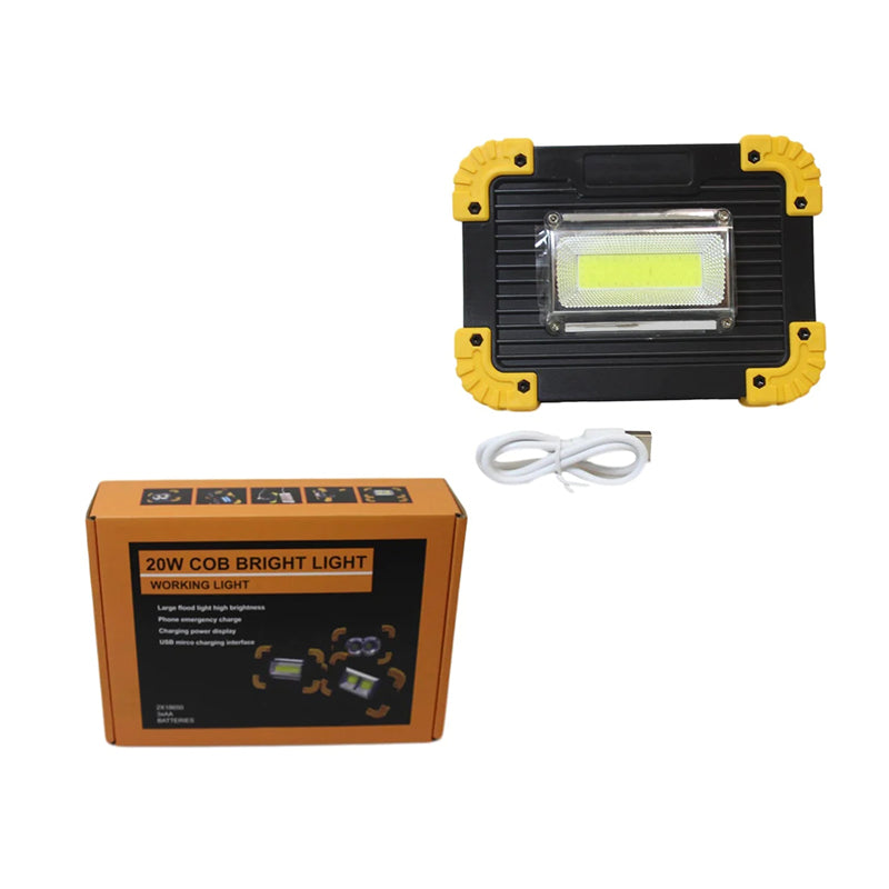 Portable COB work light with handle, black body and yellow corners, includes white cable