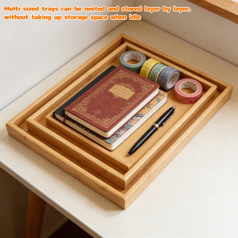 Bamboo wooden nested trays displaying a notebook, pen, and tape rolls