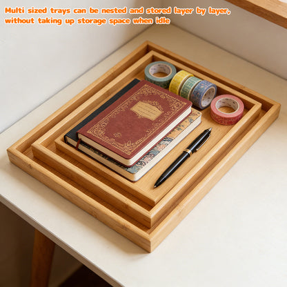 Bamboo wooden nested trays displaying a notebook, pen, and tape rolls