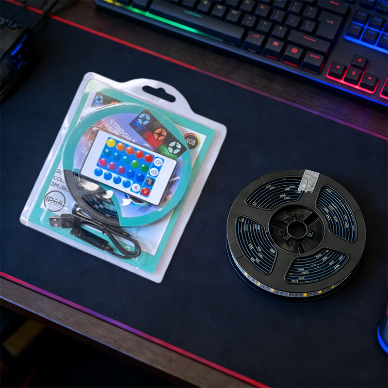 RGB LED strip kit with remote controller and adhesive strip on a spool