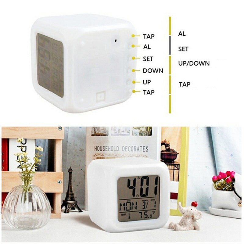 White cube LED digital alarm clock with side tap controls and button labels