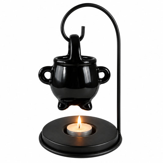 Black ceramic cauldron oil burner on loop stand with lit tealight in top dish