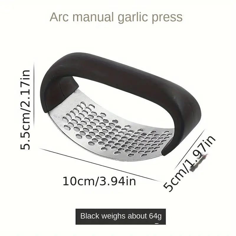 Black manual garlic press with stainless grating plate and curved rocker handle