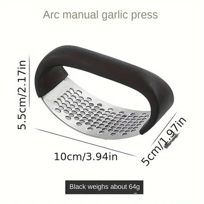 Black manual garlic press with stainless grating plate and curved rocker handle