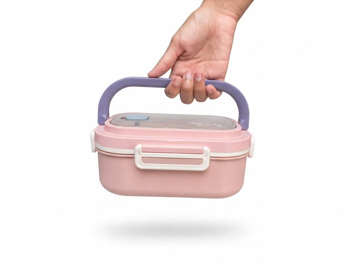 Pink bento lunch box with carry handle and front latch, ready for meals