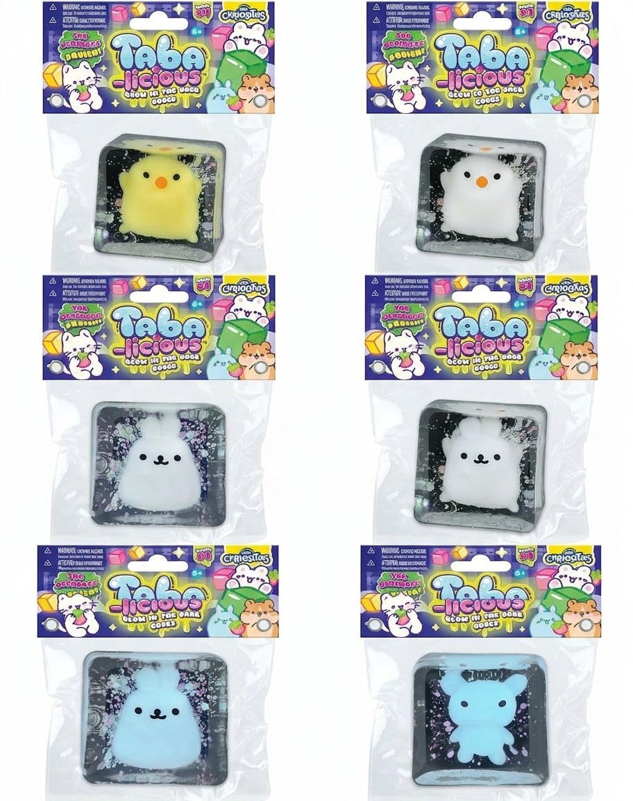 Assorted glow-in-the-dark squishy animal toys in sealed retail packages