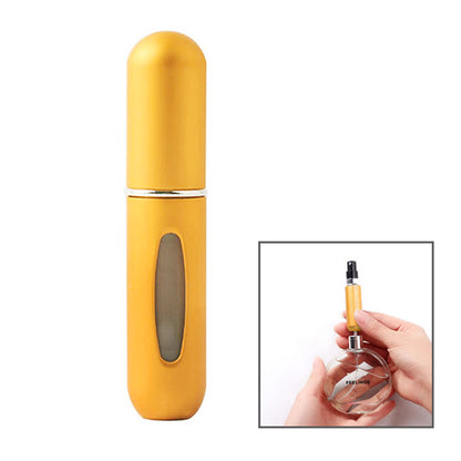 Gold travel perfume atomizer bottle with oval refill window and spray pump