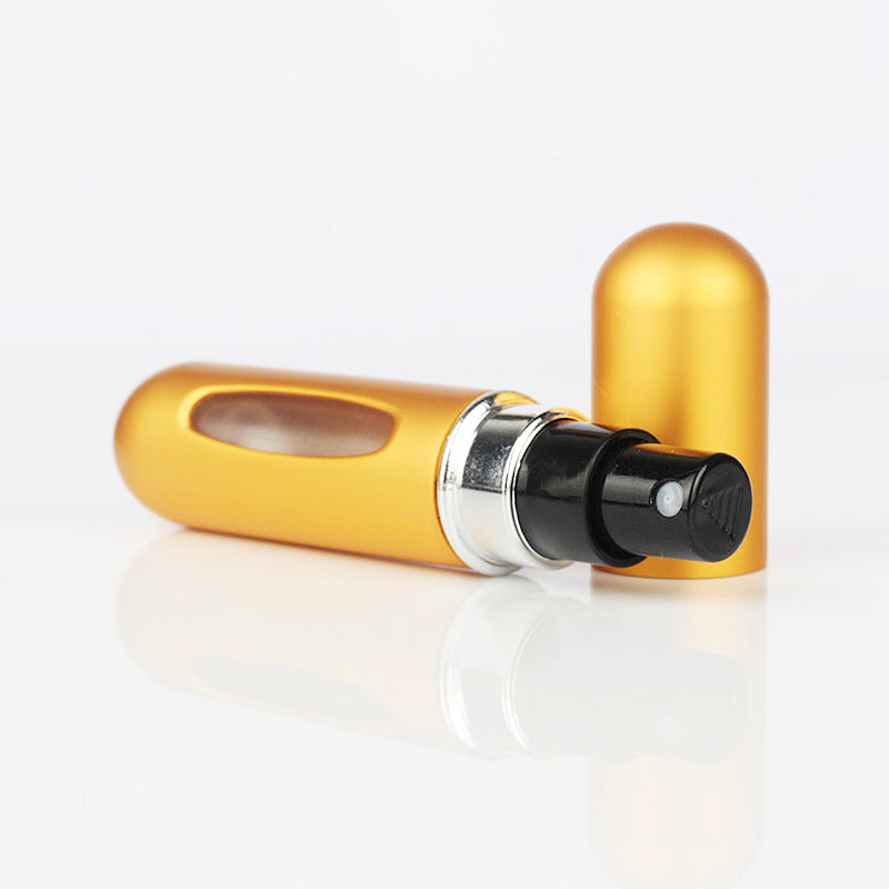 Gold mini refillable perfume atomizer spray bottle, round tube with pump nozzle