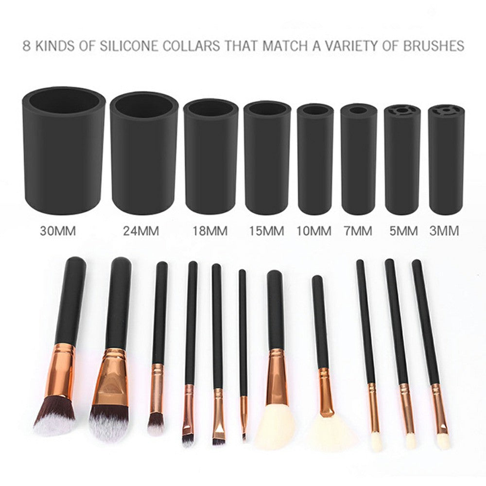 Assorted black silicone brush cleaning collars and makeup brushes with copper tips