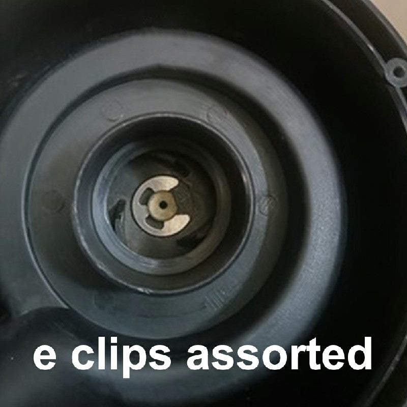 Stainless steel E-clip installed on a shaft retaining ring
