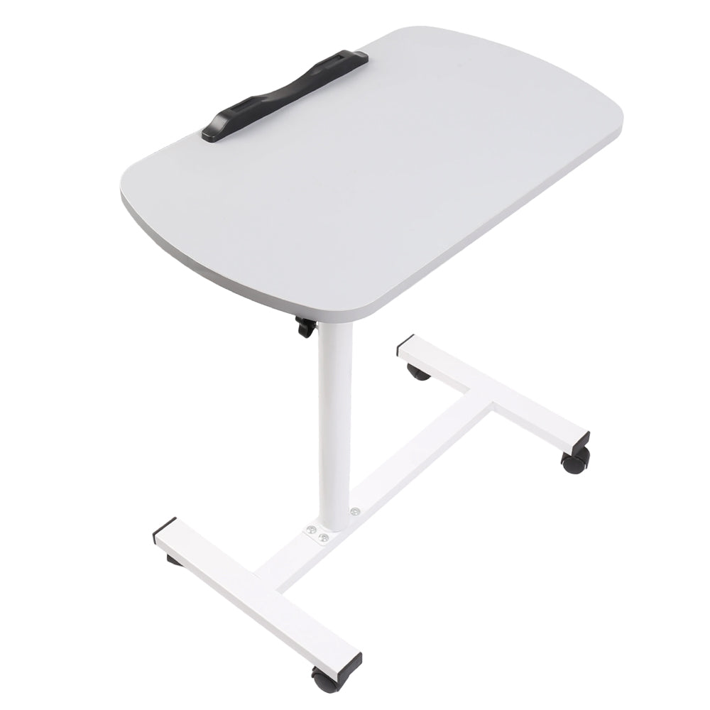 Overbed table tray on caster wheels, light grey top with black handle, angled view