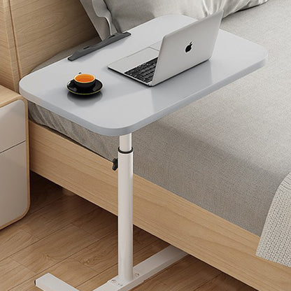 Adjustable overbed table with light grey tabletop, white legs, caster wheels