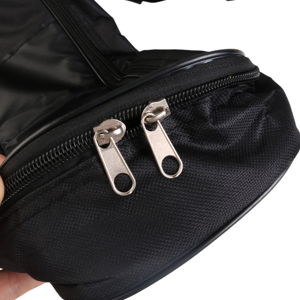 Black guitar gig bag close-up of dual metal zipper pulls on front compartment