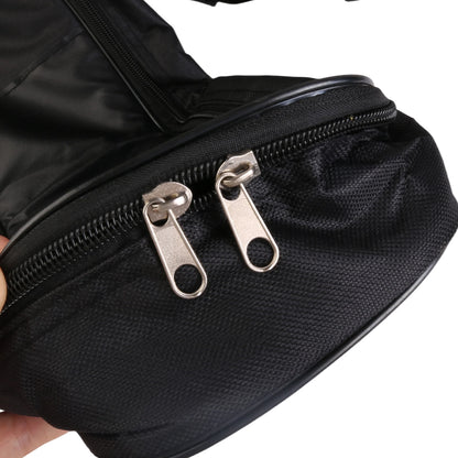 Black guitar gig bag close-up of dual metal zipper pulls on front compartment