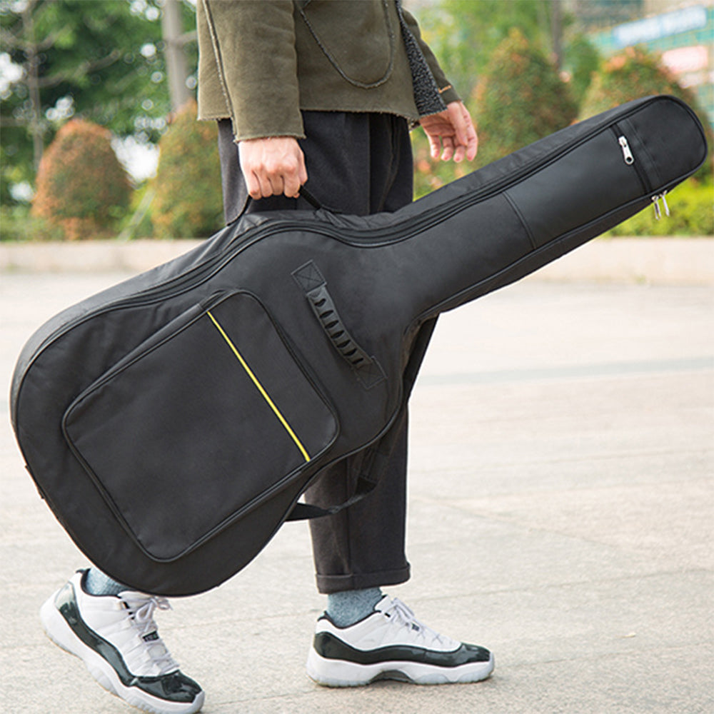 Black full-size guitar gig bag with padded body, front pocket, and carry handle