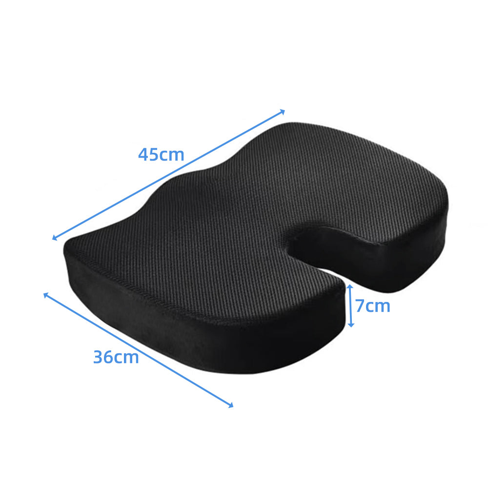 Black ergonomic seat cushion with coccyx opening, contoured memory foam shape
