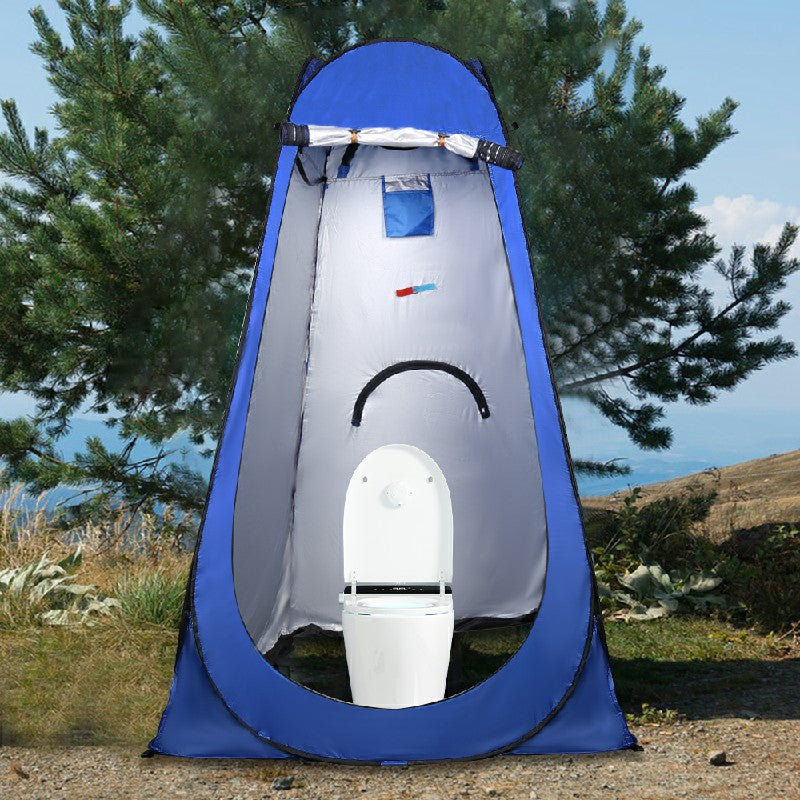 Blue pop-up shower changing tent with open front and white portable toilet inside