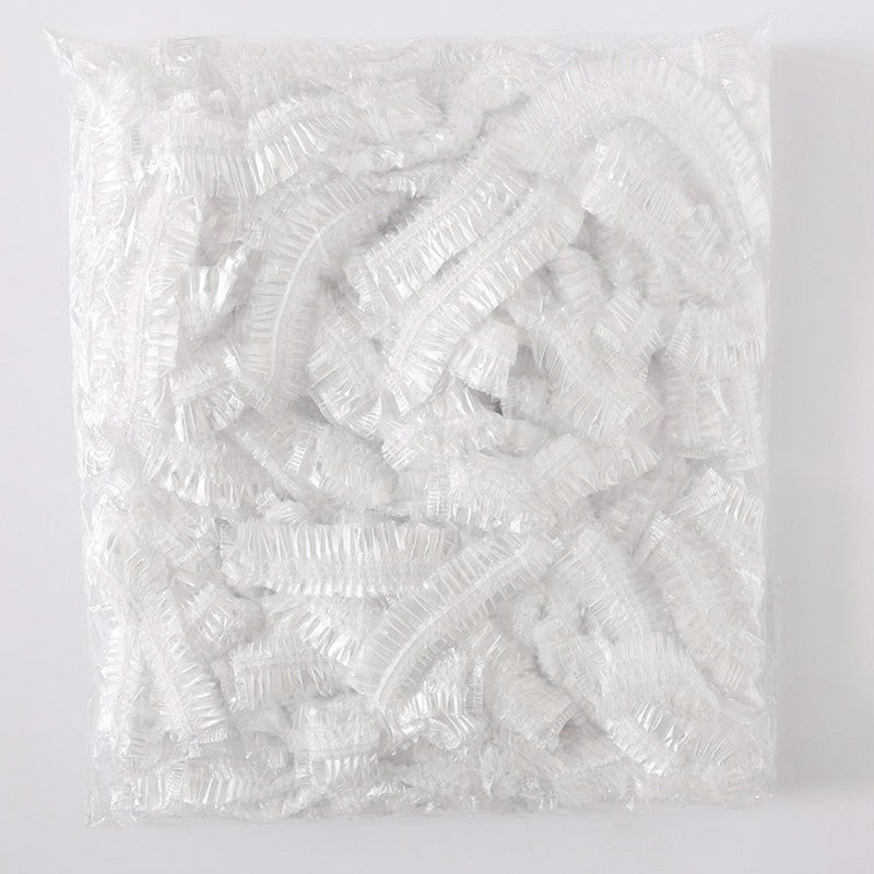 Disposable transparent shower cap, close-up of textured material and folds