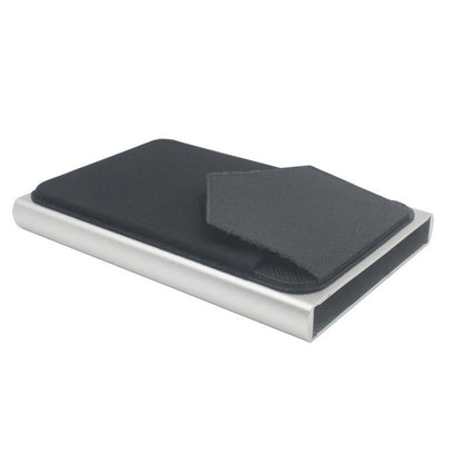 Slim metal credit card wallet with dark fabric cover and card pocket, silver border