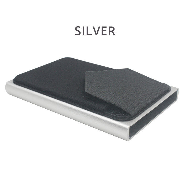 Slim metal credit card wallet with dark fabric sleeve and open pocket, silver edge