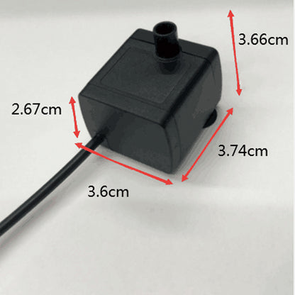 Compact black solar water pump with outlet pipe and attached power cable