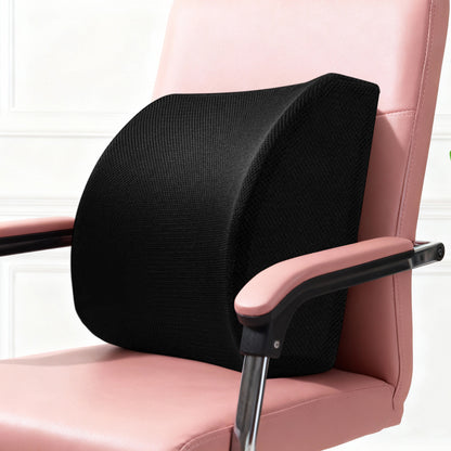 Black lumbar support cushion secured with strap on chair backrest